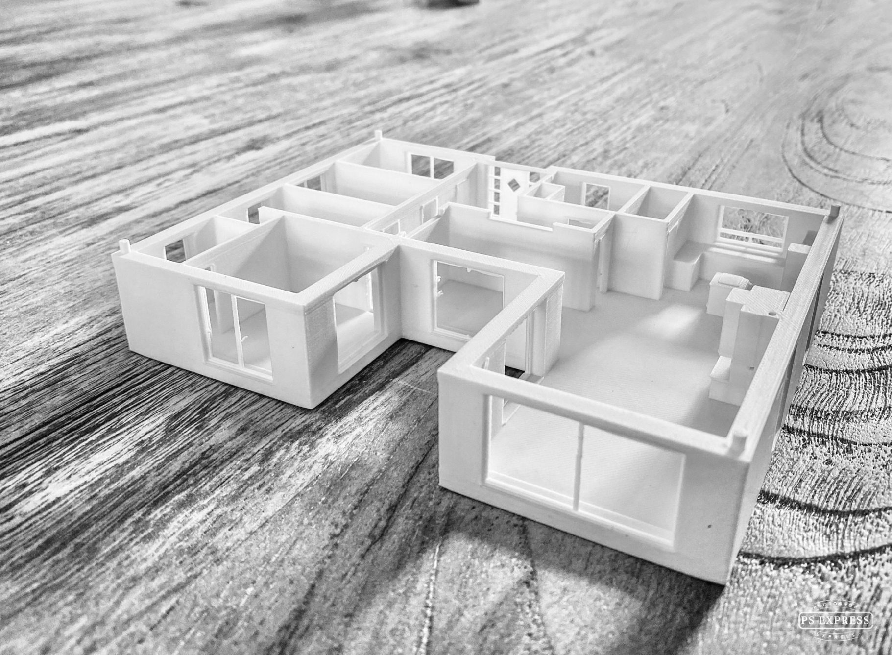 Planung/ Entwurf: Christianus Modell eines Hauses in Weiß, mit klaren Raumaufteilungen.